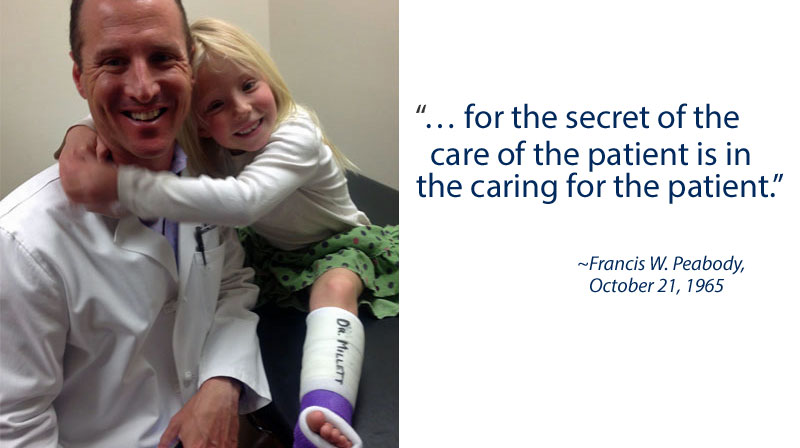 Dr.-Millett-with-patient
